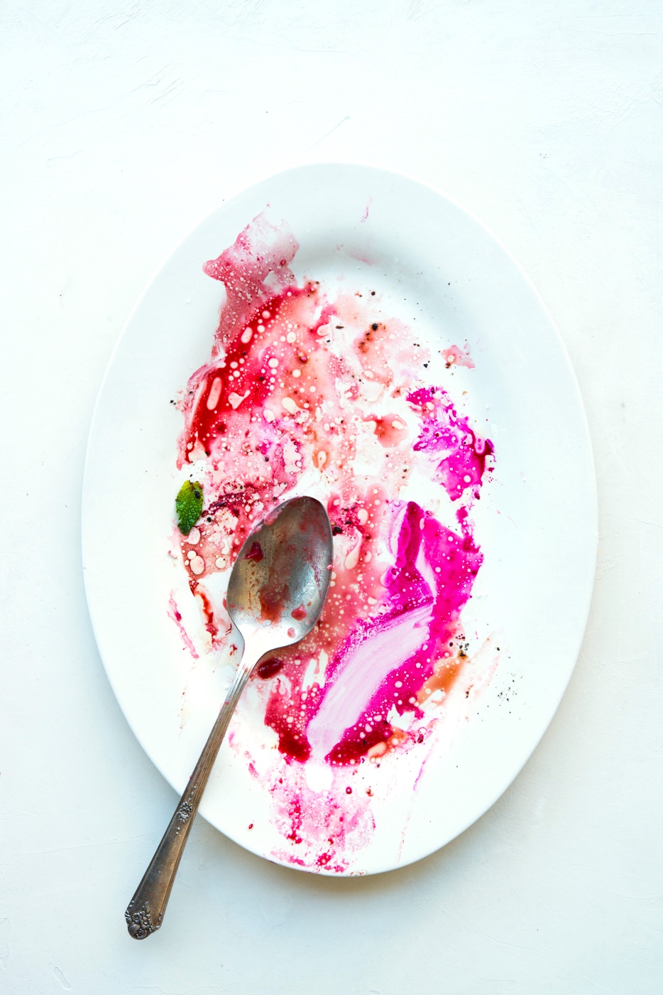 Empty plate with beet juice by commercial food photographer Sarah Flotard  