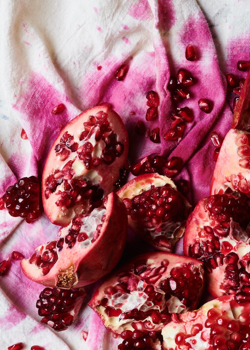 Pomegranates cut and squeezed by commercial food photographer Sarah Flotard  